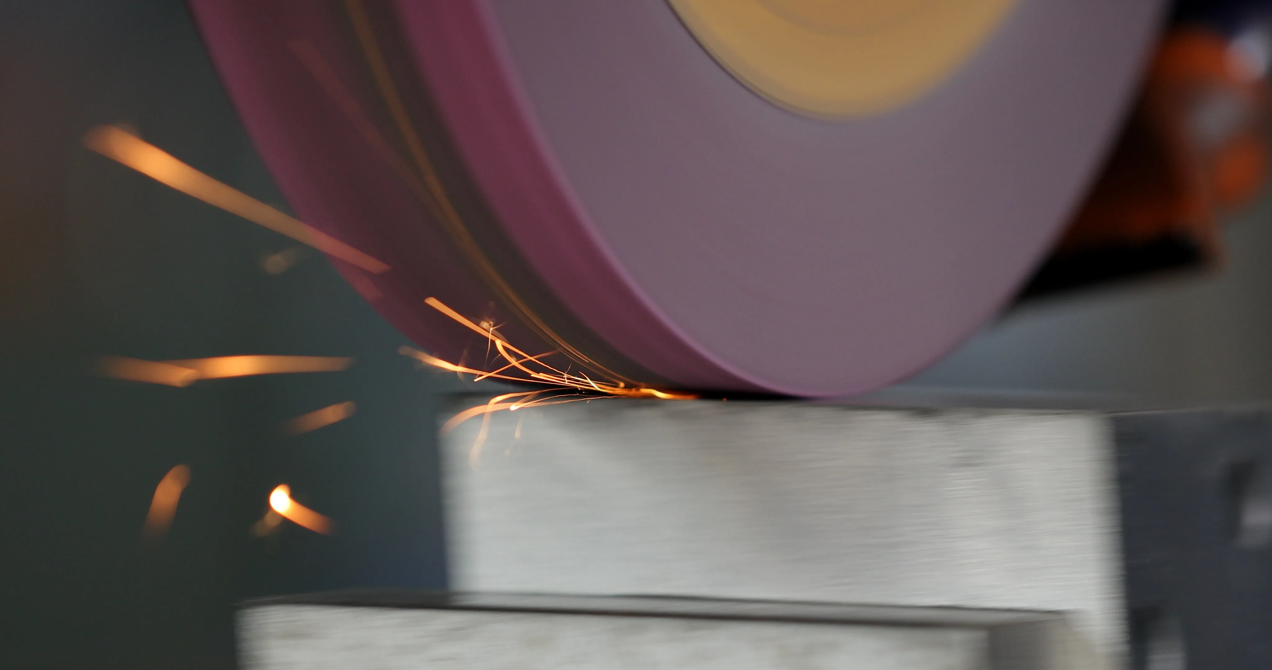 Grinding operation on a metal component