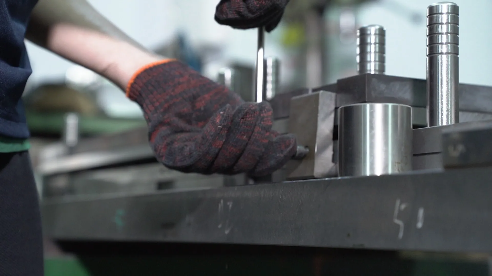 Technicians assembling stamping tooling