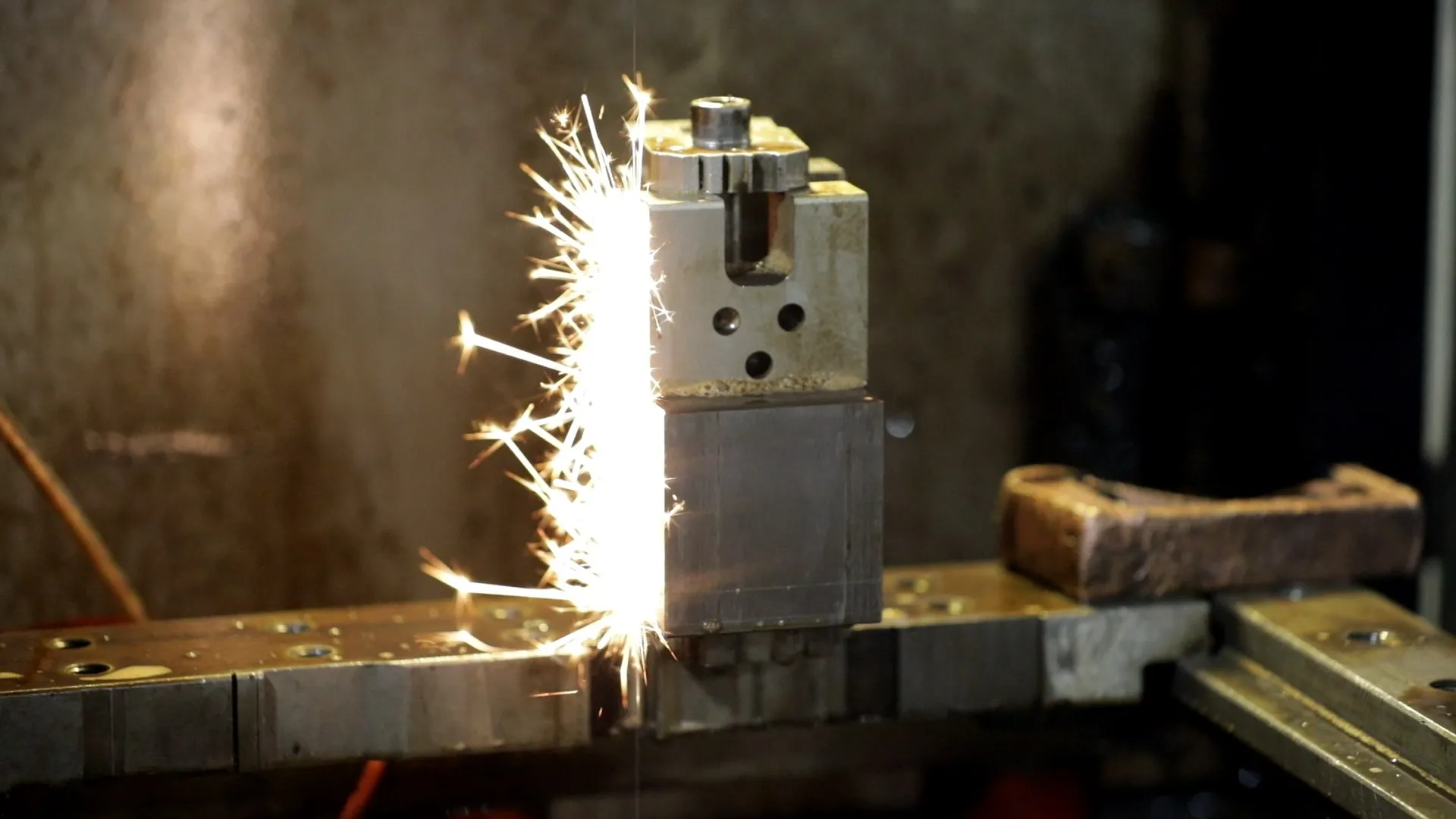 Wire EDM machine in operation